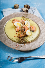 quail eggs with grilled salmon cubes over potato cream easter menu