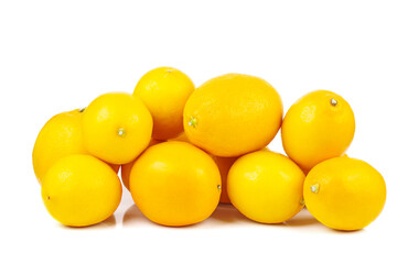 Pile of ripe lemons isolated on a white background