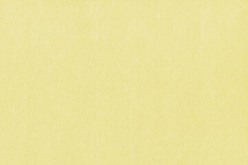 Clean yellow retro paper background. Vintage cardboard texture. Grunge paper for drawing. Simple blank fabric pattern.