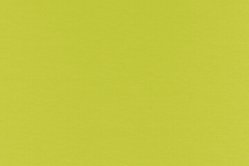 Clean yellow retro paper background. Vintage cardboard texture. Grunge paper for drawing. Simple blank fabric pattern.