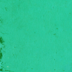 Cardboard green abstract pattern texture close-up. Retro old paper background. Grunge concrete wall. Vintage blank wallpaper.