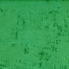 Cardboard green abstract pattern texture close-up. Retro old paper background. Grunge concrete wall. Vintage blank wallpaper.