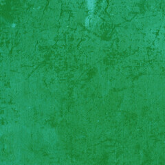 Cardboard green abstract pattern texture close-up. Retro old paper background. Grunge concrete wall. Vintage blank wallpaper.