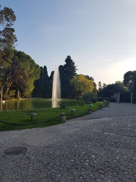 Foutain and a garden in Peralada, Catalonia. Green grass. 