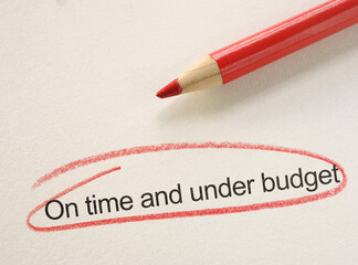 On Time And Under Budget text circled in red pencil
