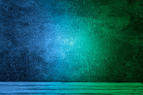 Neon light on concrete wall texture background. Lighting effect blue and green neon background for product display, banner, or mockup