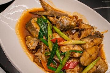 Blue salmon with soy sauce and green garlic, traditional Chinese cuisine in Fujian, China.