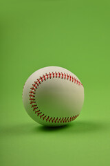 Close up one baseball ball over green