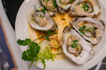 Steamed oysters with garlic sauce, traditional Chinese cuisine in Fujian.