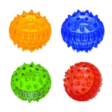 Colorful massage balls for Su jok therapy close - up isolated on a white background. Massager Su Jok for fingers.
