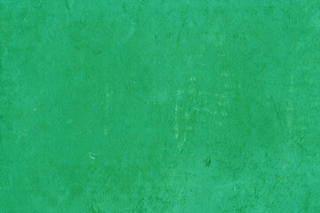 Fototapeta na wymiar Cardboard green abstract pattern texture close-up. Retro old paper background. Grunge concrete wall. Vintage blank wallpaper.