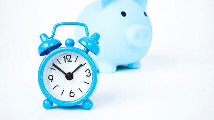 a piggy bank. moneybox and clock on a white background