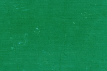 Obraz premium Cardboard green abstract pattern texture close-up. Retro old paper background. Grunge concrete wall. Vintage blank wallpaper.