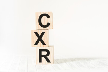 wooden cubes with text CXR . the medicine. medical concept