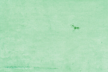 Cardboard green abstract pattern texture close-up. Retro old paper background. Grunge concrete wall. Vintage blank wallpaper.