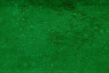 Cardboard green abstract pattern texture close-up. Retro old paper background. Grunge concrete wall. Vintage blank wallpaper.