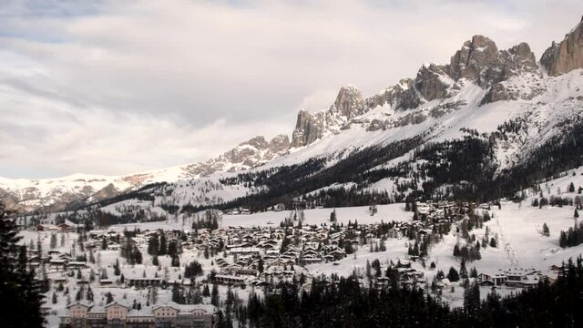 The Rosengarten-Schlern group (Gruppo Catinaccio Sciliar) and the village of Karersee or Carezza in the Dolomites in Italian Alps, S&uuml;dtirol, Alto Adige
