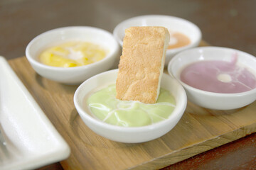 Slice steamed bread and pandan custard, Thai dessert