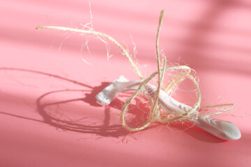 Female shaver for legs and bikini area on a pink background.