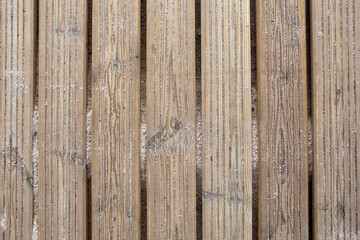 wooden broadwalk on beach, close-up