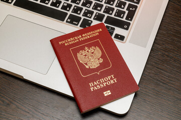 Moscow / Russia - January 21, 2021: Russian foreign passport on laptop