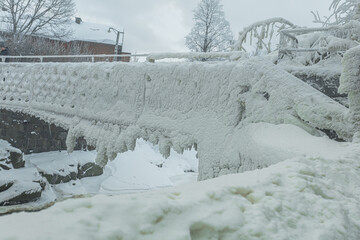 Bridge over the river, winter landscape. Snowy. Helsinki, Finland Vanhakaupunki