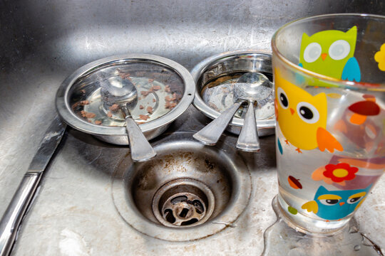 Dirty Dishes In The Sink. Calgary, Alberta, Canada