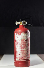 Obraz premium red fire extinguisher