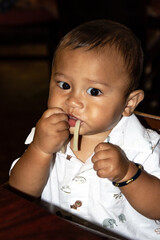 Filipino Americana baby loves eating Udon noodles 

