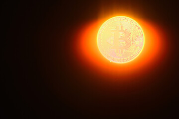 bright glowing bitcoin instead a sun with and rays on black