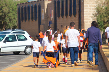 School kids enjoying an outdoor walk during corona pandemic restrictions (Tenerife, Spain) 