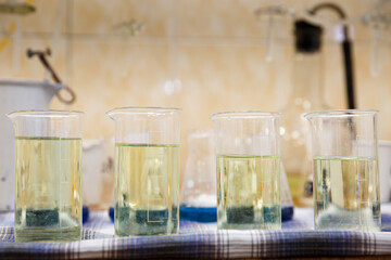 Tanks with chemical reagents in the laboratory