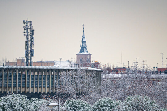 Bullring in the municipality of Getafe after a heavy snowfall, and roof of the Magdalena Cathedral