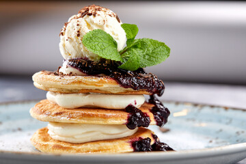 pancakes with ice cream and berries