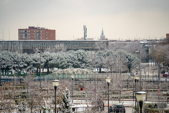 Bullring in the municipality of Getafe after a heavy snowfall, and roof of the Magdalena Cathedral