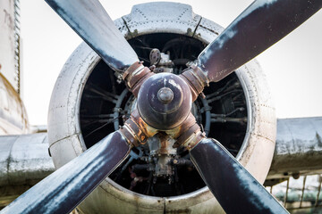 Old rusted airplane engine in close up shot, in landscape orientation