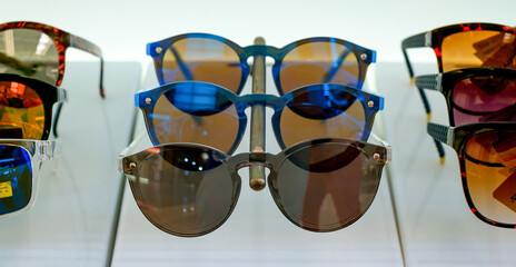 Designer sunglasses for sale in duty free store at airport