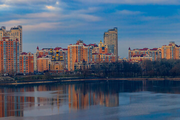 View of Obolon embankment of the Dnieper river and church of the Nativity of Christ in Kiev, Ukraine