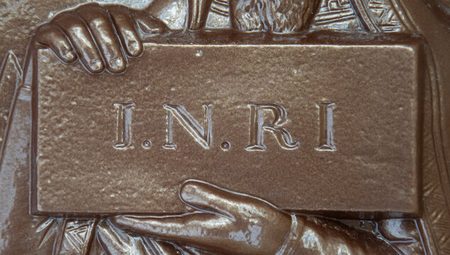 Sign INRI (Iesus Nazarenus, Rex Iudaeorum) King of the Jews, on copper plate. 