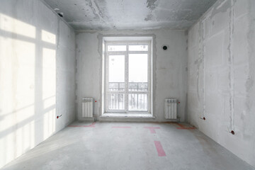interior of the apartment without decoration in gray colors
