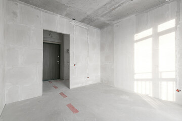 interior of the apartment without decoration in gray colors