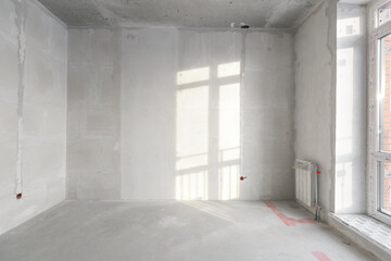interior of the apartment without decoration in gray colors