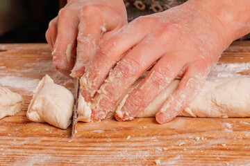 Close up young woman preparing sweet desert at home kitchen. National food, eating, delishion, diet concept.