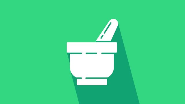 White Mortar and pestle icon isolated on green background. 4K Video motion graphic animation.