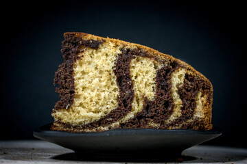 
close up of delicious vanilla cake with chocolate zebra cake texture