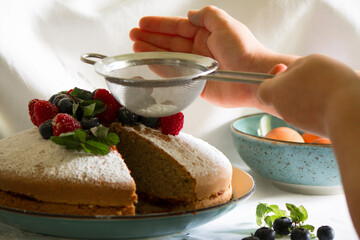 buckwheat cake with cranberry jam with powered sugar