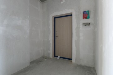 interior of the apartment without decoration in gray colors