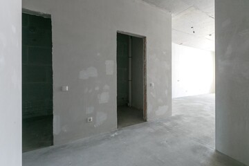 interior of the apartment without decoration in gray colors