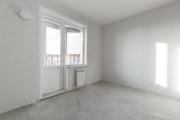 interior of the apartment without decoration in gray colors