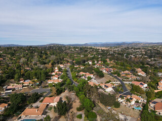Fototapeta premium Aerial view of green valley with villas in The East Canyon Area of Escondido, San Diego, California